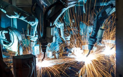 Movement of the robot welding in an auto parts factory. Team welding robots represent the movement in the automotive parts industry